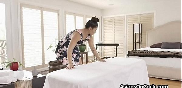  Asian masseuse ends up riding a big black cock